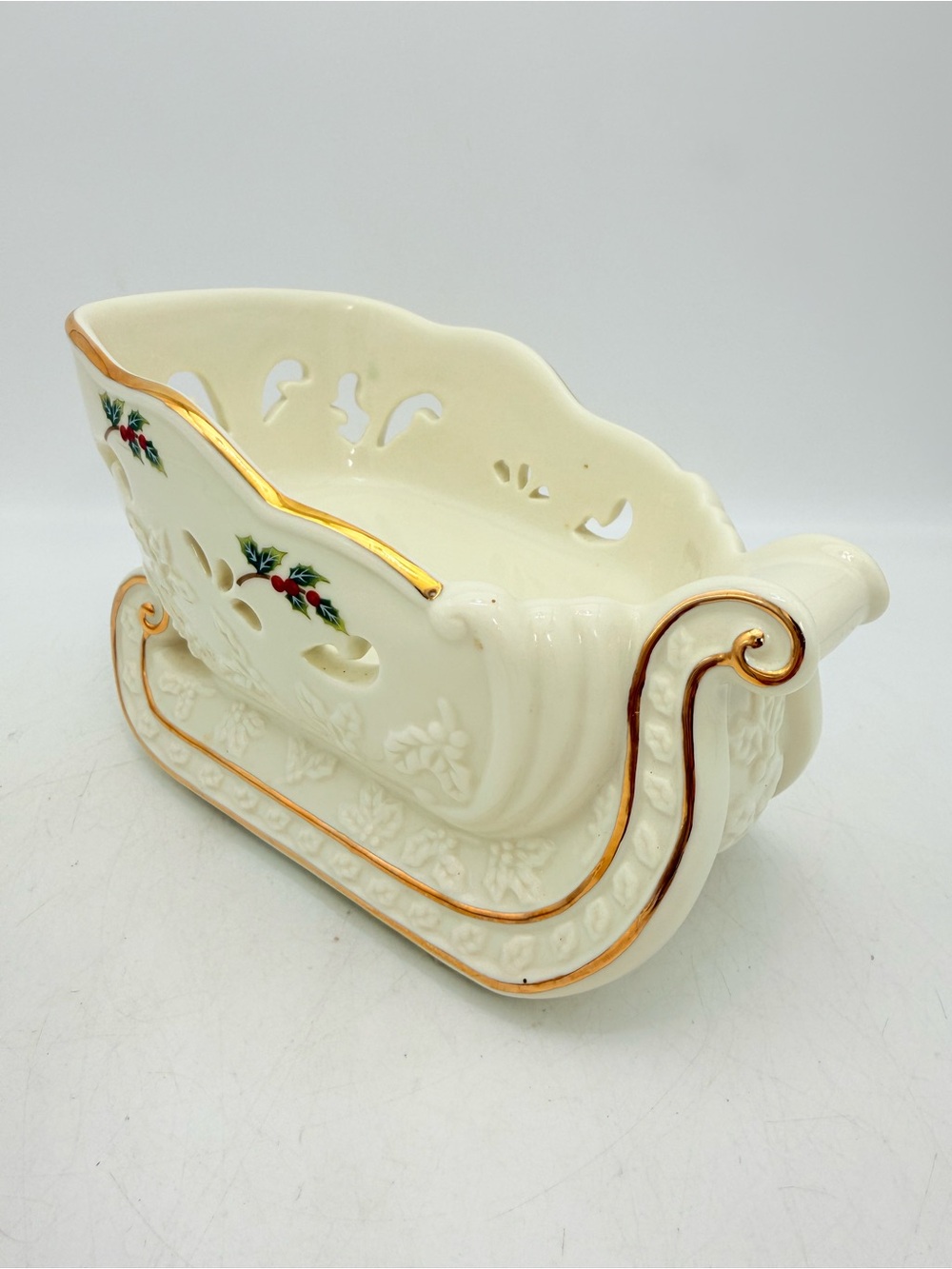 Ivory Ceramic Decorative Sleigh with Gold Trim and Holly Detail - partylite